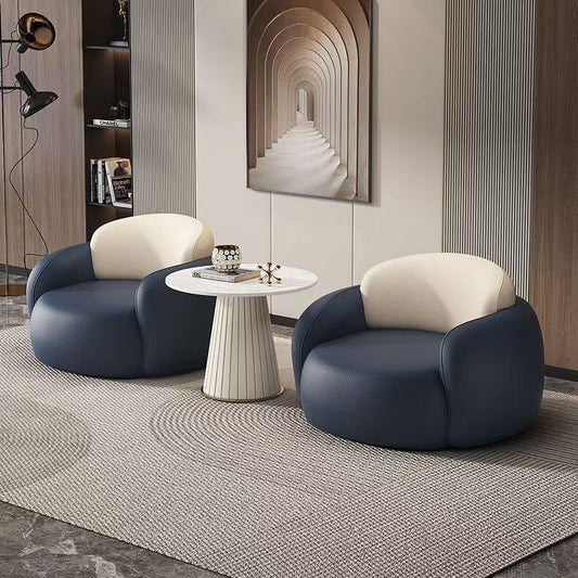 Modern 3-Piece Lounge Chairs and Round Fluted Side Table.