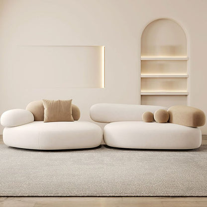 Symmetrical Bow Front Corner Sectional with Round Arm & Concealed Support.