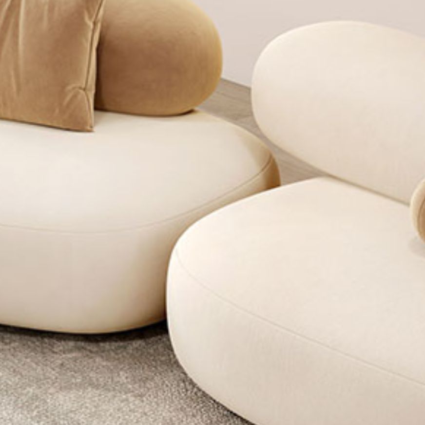 Symmetrical Bow Front Corner Sectional with Round Arm & Concealed Support.