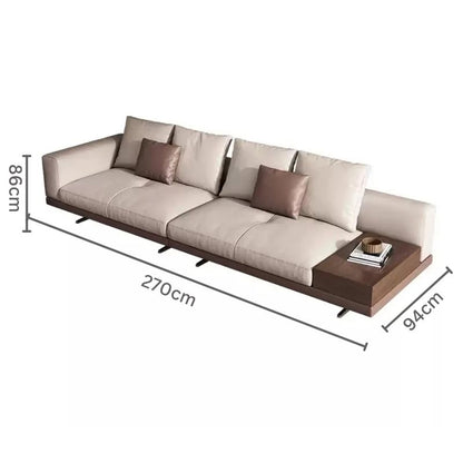 Modern Simple Sofa With One Sided Armrest, Upholstered in Leather.