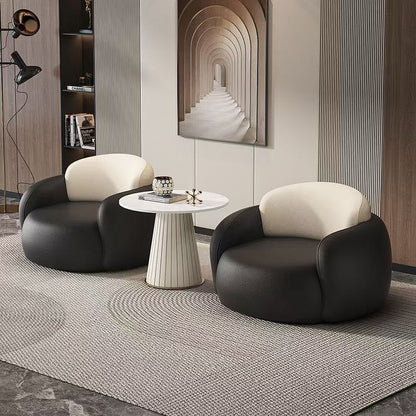 Modern 3-Piece Lounge Chairs and Round Fluted Side Table.