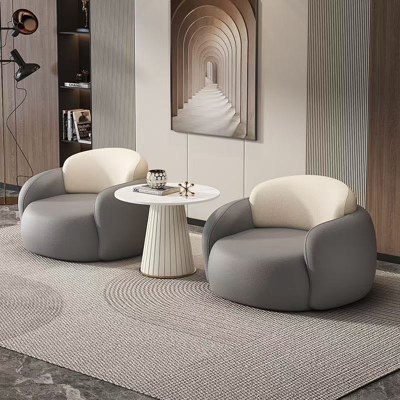 Modern 3-Piece Lounge Chairs and Round Fluted Side Table.