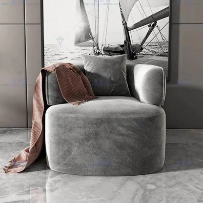 Elegant Gray Sofa with Single Chair and Ottoman Set.