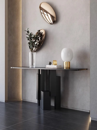 Black Stone Top Rectangular Console Table with Abstract Metal Base.